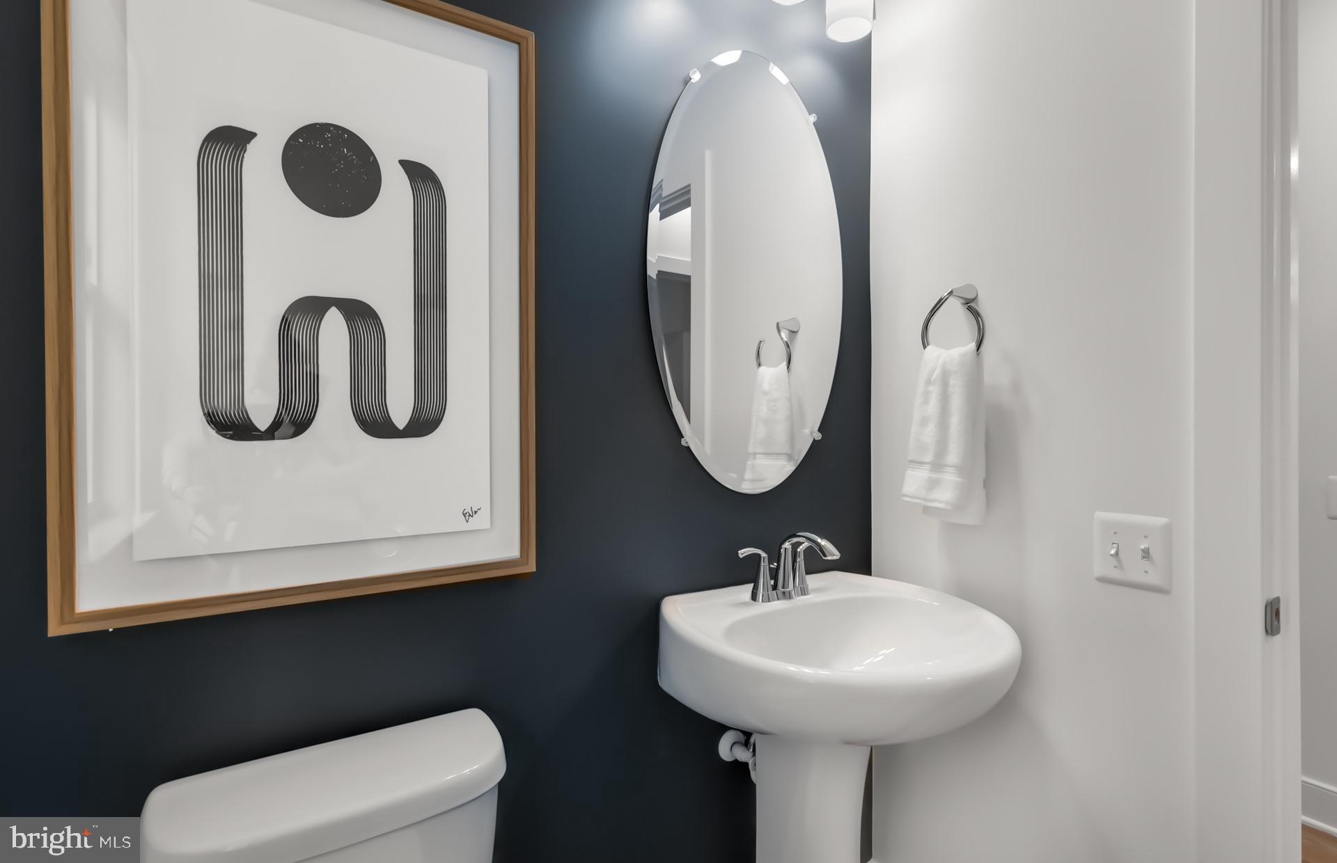 18260 Hobbes Rst Lane Leesburg, VA 20176 - Photo 24 of 63 a bathroom with a sink mirror and toilet