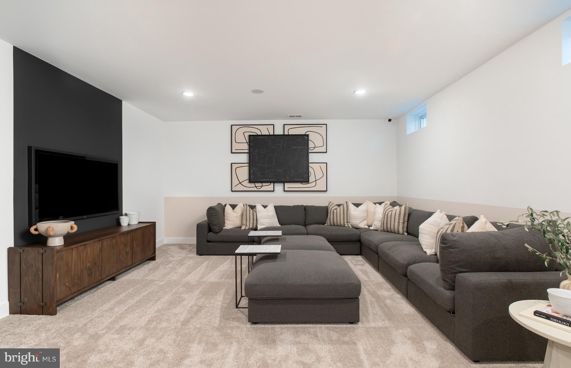 18260 Hobbes Rst Lane Leesburg, VA 20176 - Photo 42 of 63 a living room with furniture and a flat screen tv