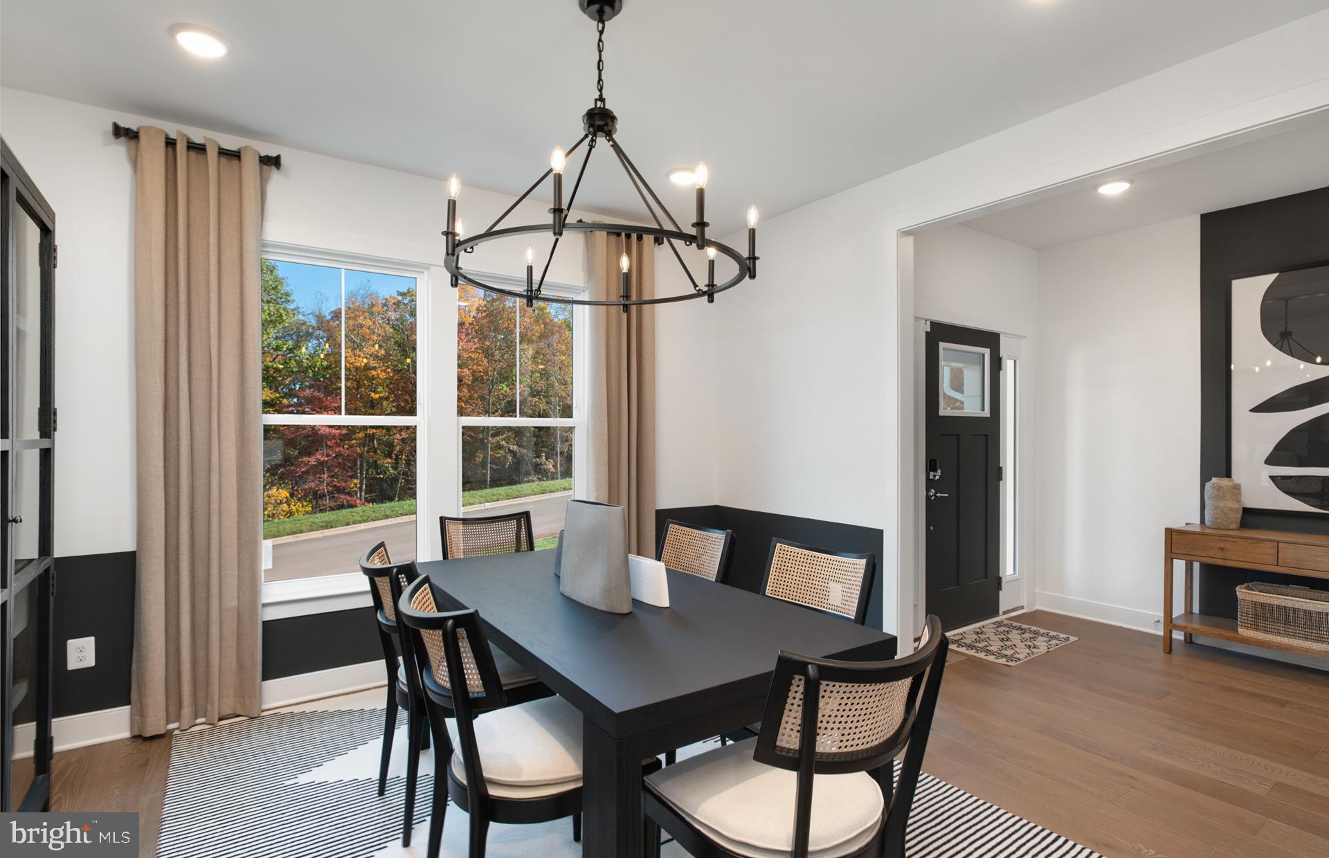 18260 Hobbes Rst Lane Leesburg, VA 20176 - Photo 7 of 63 a view of a dining room with furniture window and wooden floor
