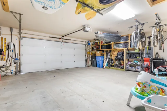 a view of a garage with storage