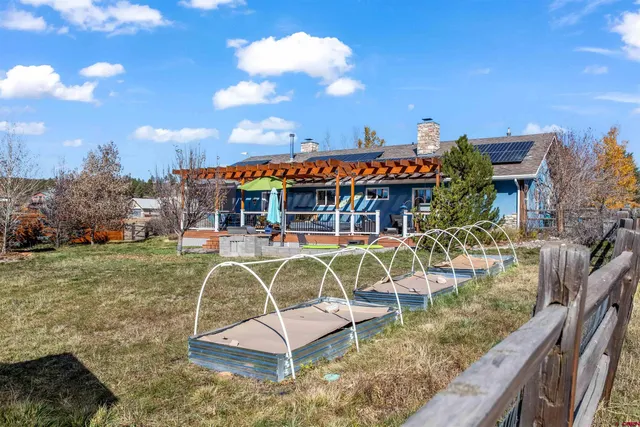 a view of a house with a swimming pool
