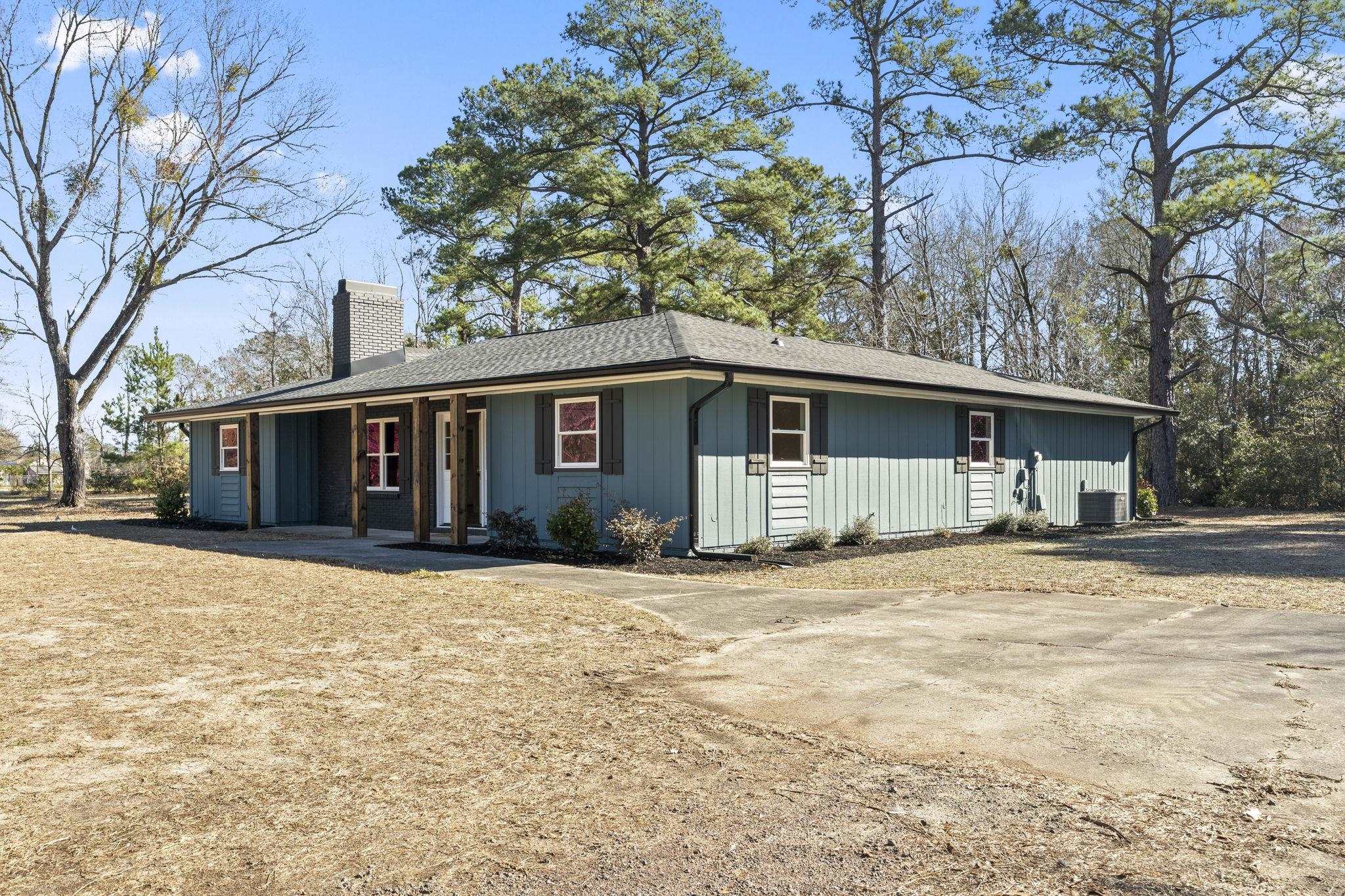 947 Fox Hollow Road Conway, SC 29526 - Photo 2 of 40 Ranch-style house with a chimney and a shingled roof