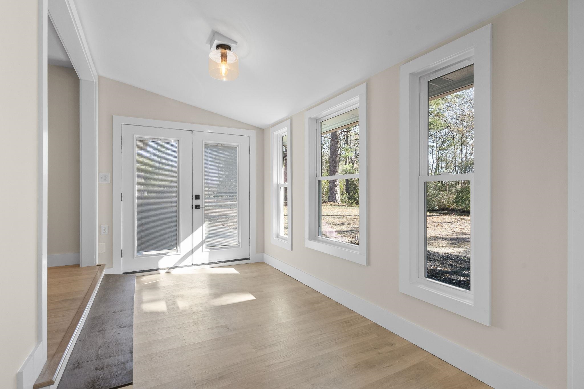 947 Fox Hollow Road Conway, SC 29526 - Photo 19 of 40 Unfurnished sunroom with lofted ceiling and french doors