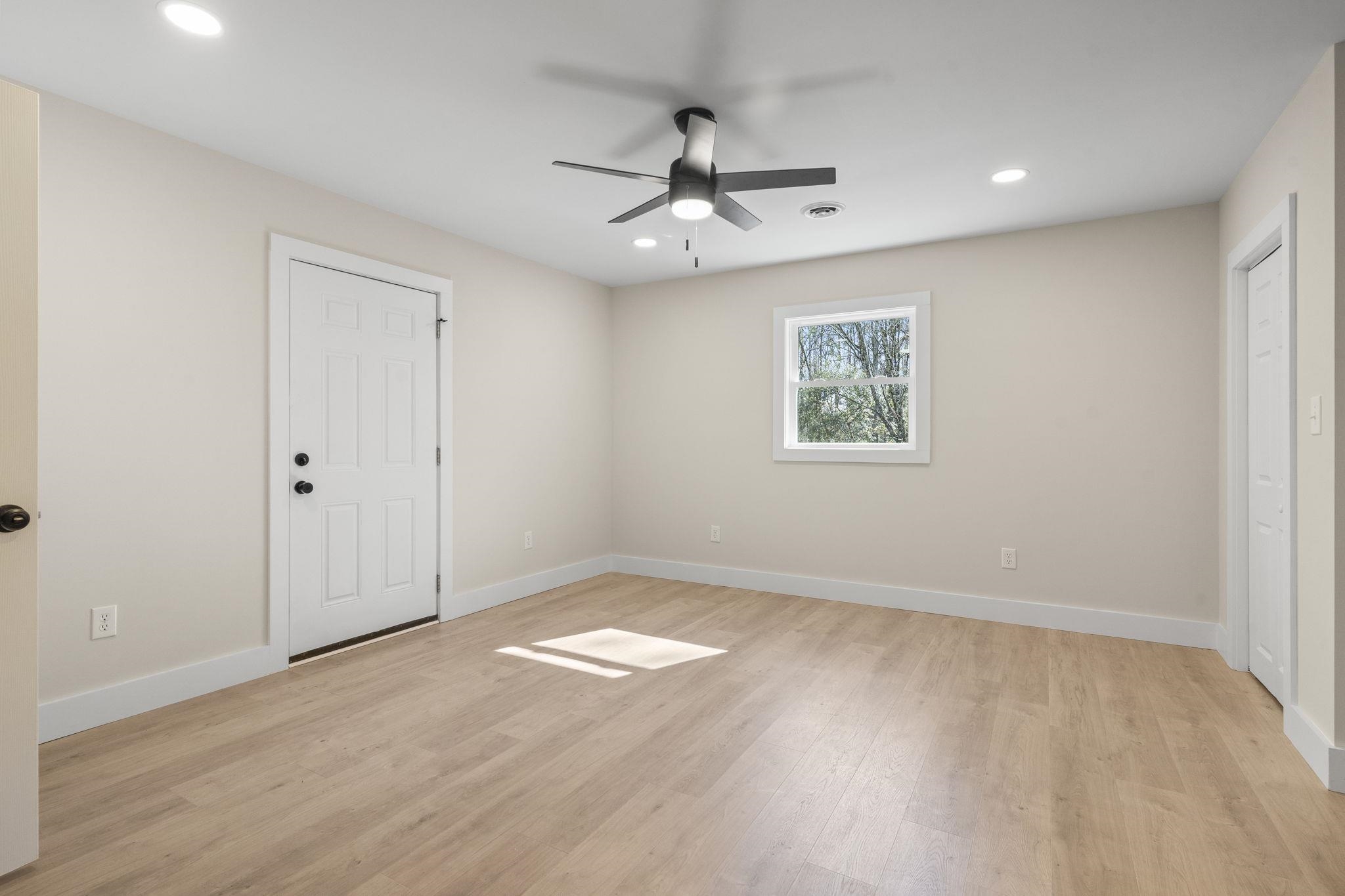947 Fox Hollow Road Conway, SC 29526 - Photo 22 of 40 Unfurnished bedroom with light wood finished floors, a ceiling fan, and recessed lighting