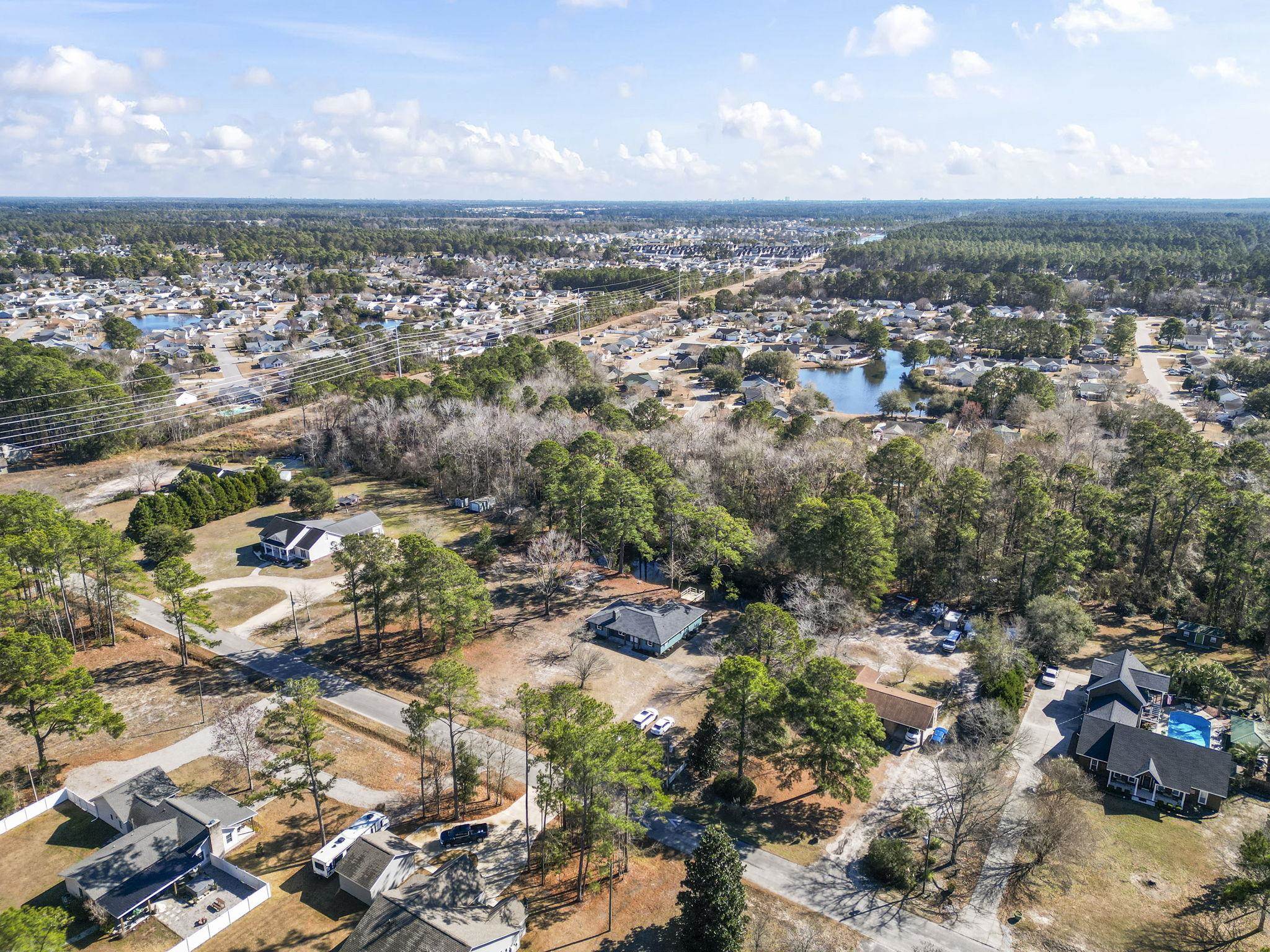947 Fox Hollow Road Conway, SC 29526 - Photo 37 of 40 Aerial overview of property's location with nearby suburban area