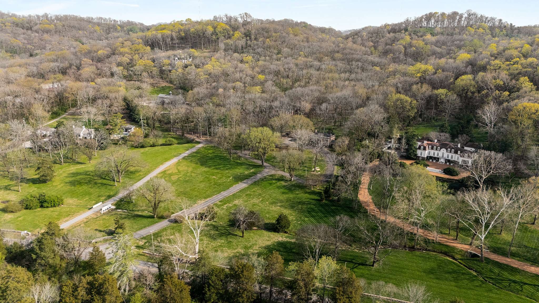 1416 Chickering Road Nashville, TN 37215 - Photo 7 of 12 an aerial view of residential houses with outdoor space and trees