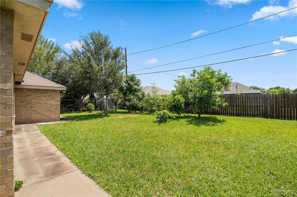 6707 South Rios Street Pharr, TX 78577 - Photo 14 of 17 a view of backyard with green space