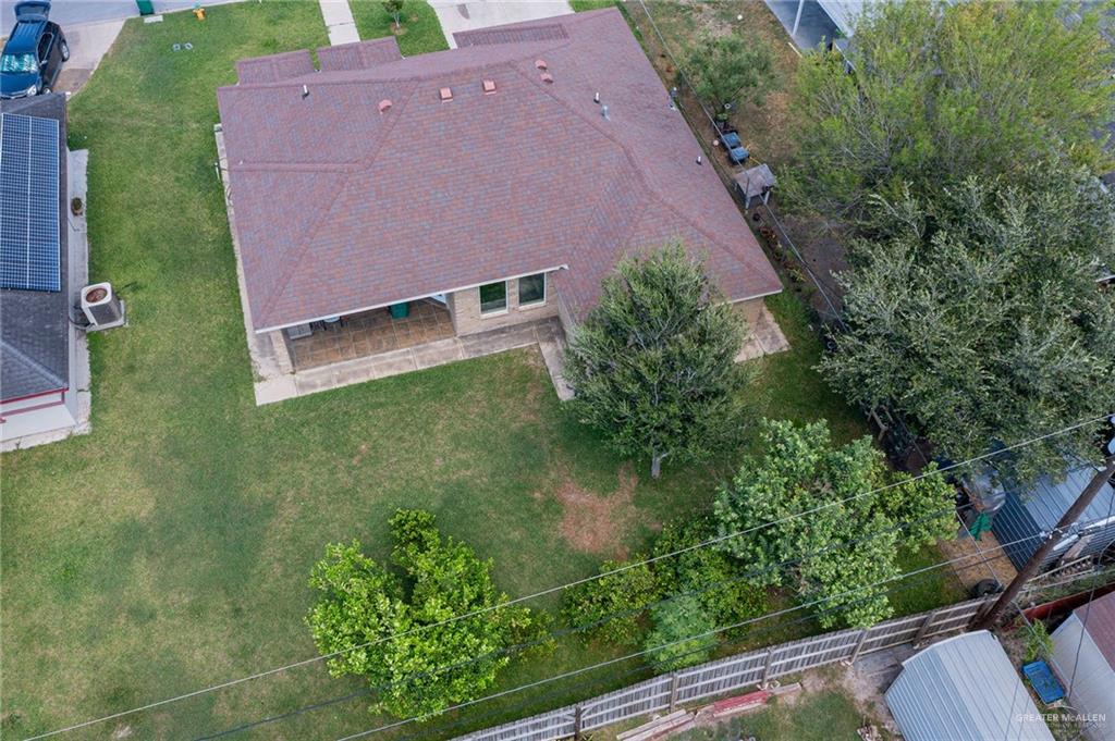 6707 South Rios Street Pharr, TX 78577 - Photo 16 of 17 an aerial view of a house with garden space and a lake view