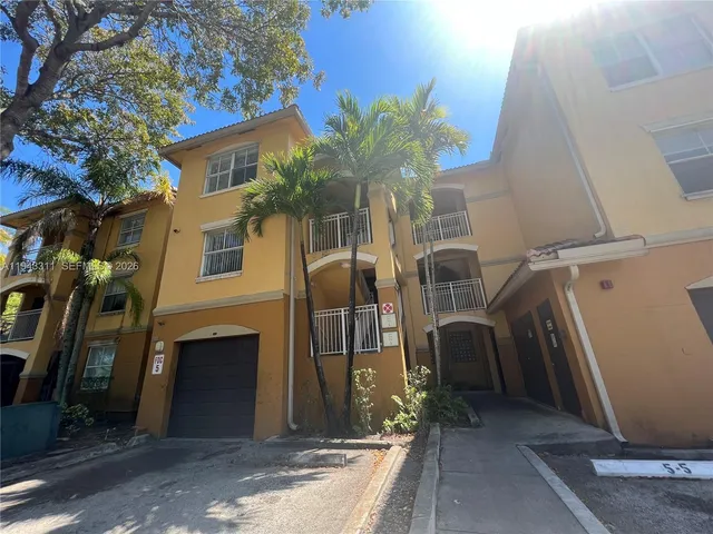 a view of a house with a garage