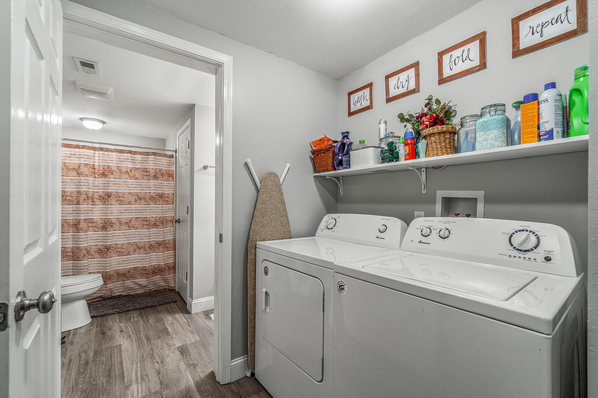 128 Sikes Drive Crestview, FL 32539 - Photo 13 of 24 a utility room with dryer and washer