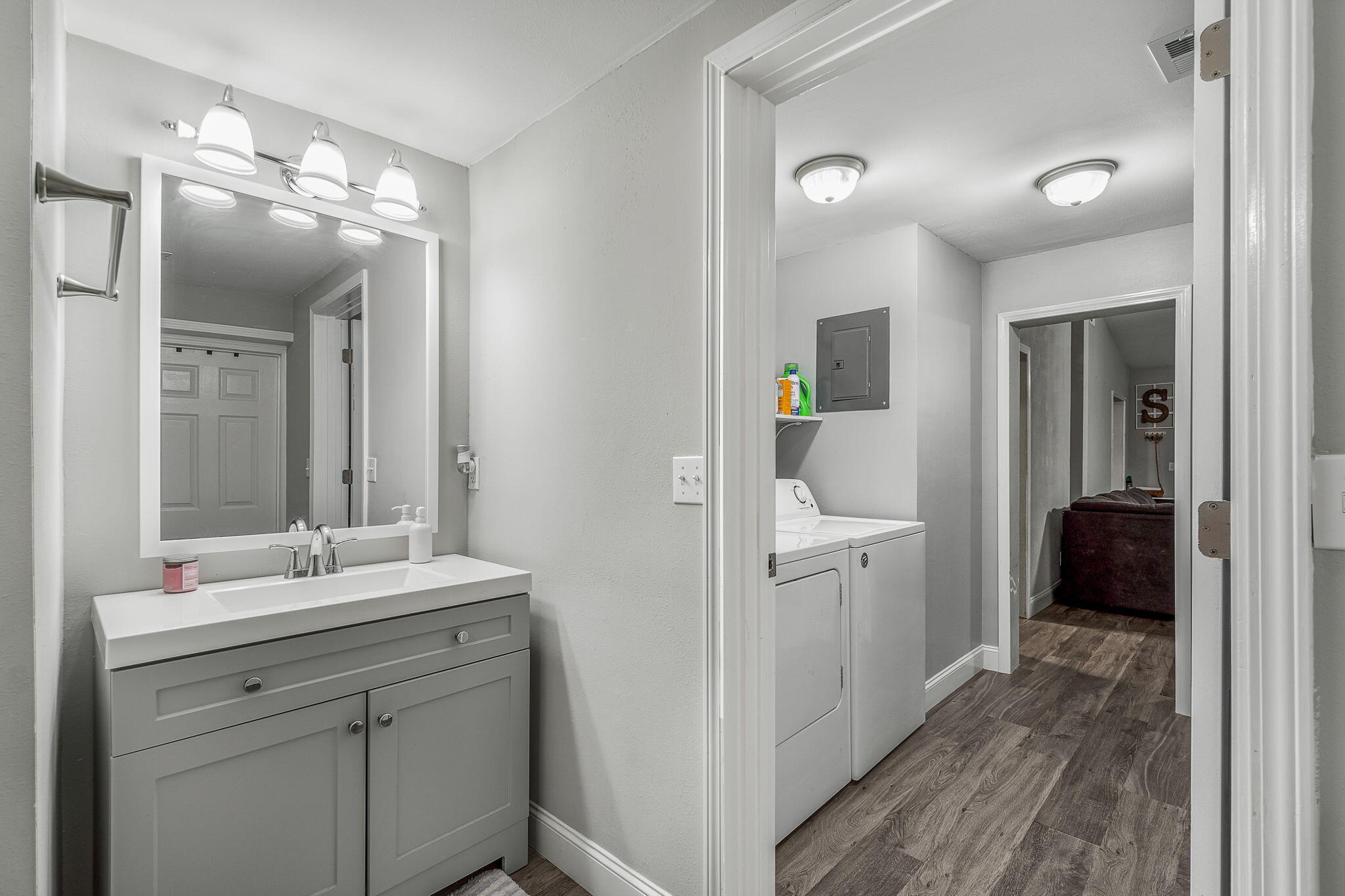 128 Sikes Drive Crestview, FL 32539 - Photo 15 of 24 a en suite bathroom with a sink and a mirror