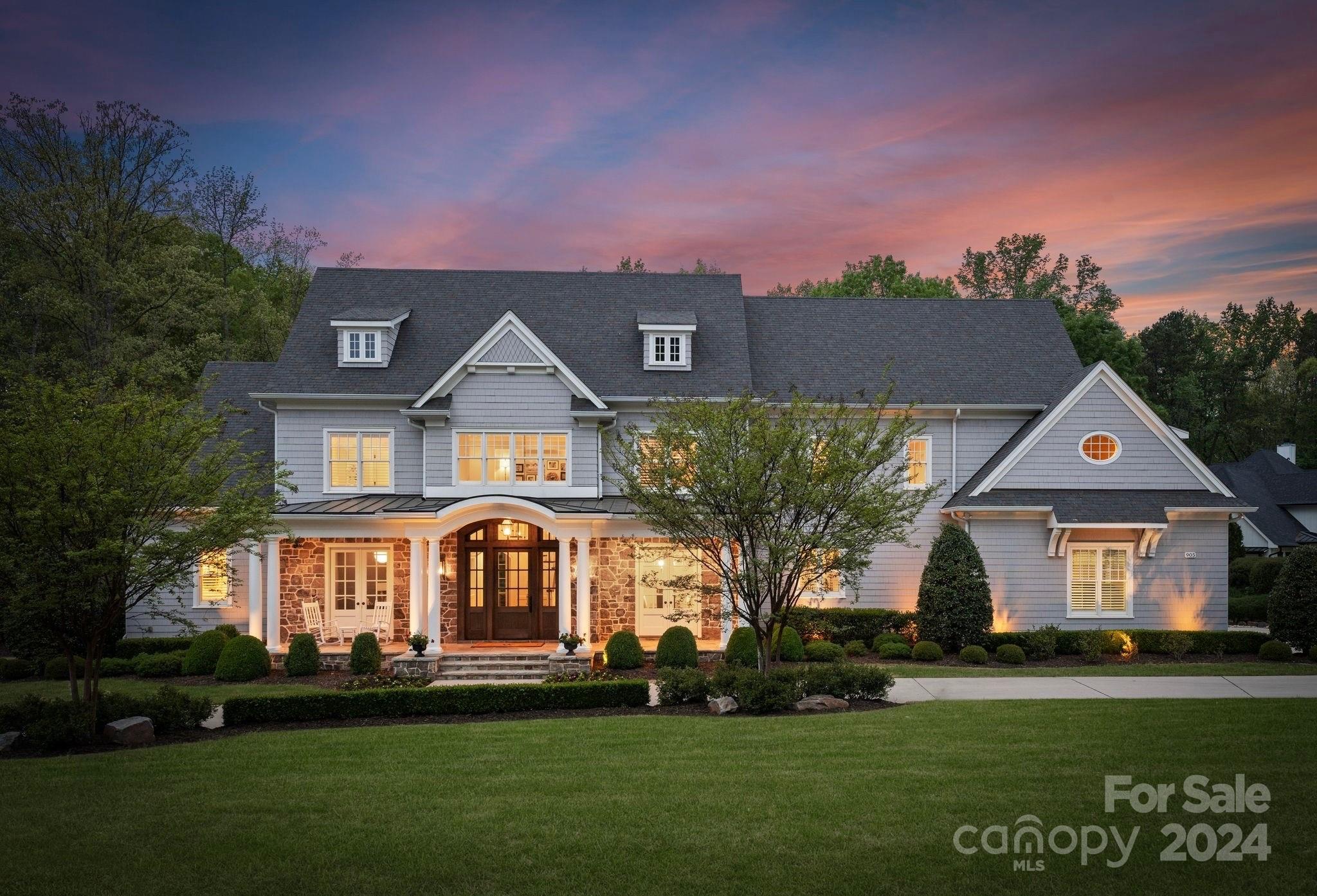 905 Martingale Lane Davidson, NC 28036 - Photo 1 of 45 a front view of a house with a yard