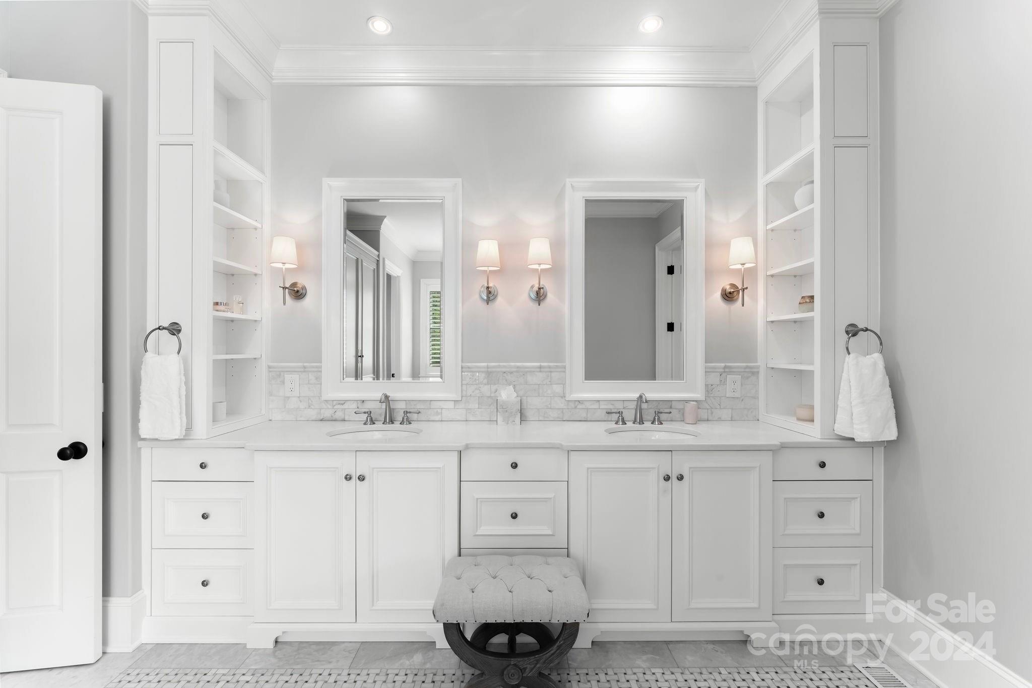 905 Martingale Lane Davidson, NC 28036 - Photo 25 of 45 a bathroom with a double vanity sink and mirror