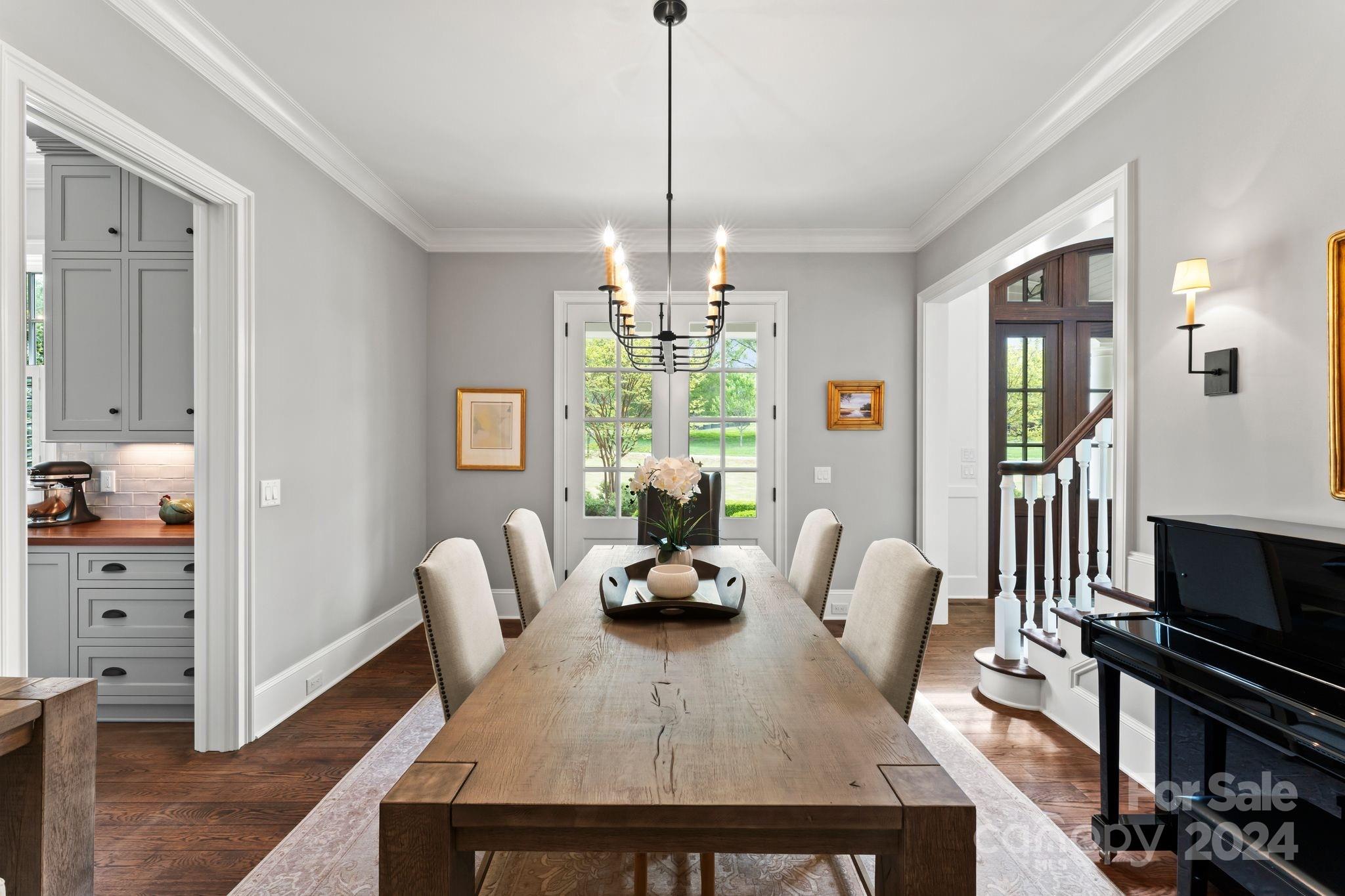 905 Martingale Lane Davidson, NC 28036 - Photo 8 of 45 a dining room with furniture and window