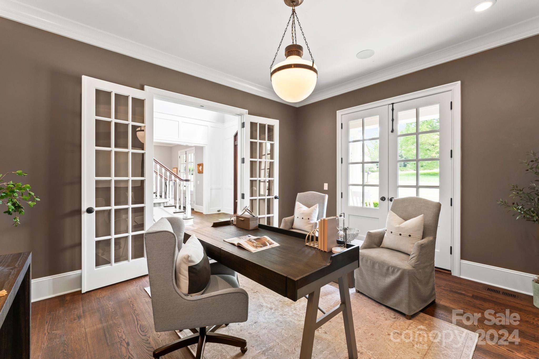 905 Martingale Lane Davidson, NC 28036 - Photo 9 of 45 a view of a dining room with furniture window and wooden floor