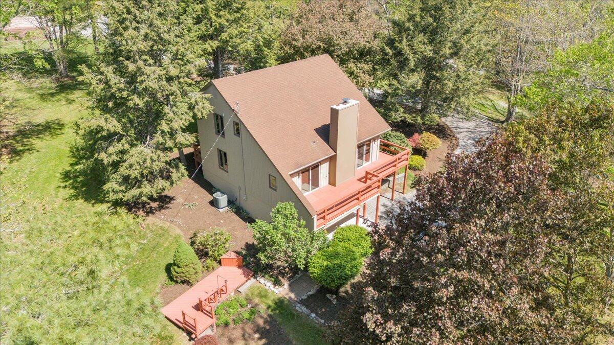 1465 Poff School Road Riner, VA 24149 - Photo 2 of 77 an aerial view of a house with a yard and trees all around
