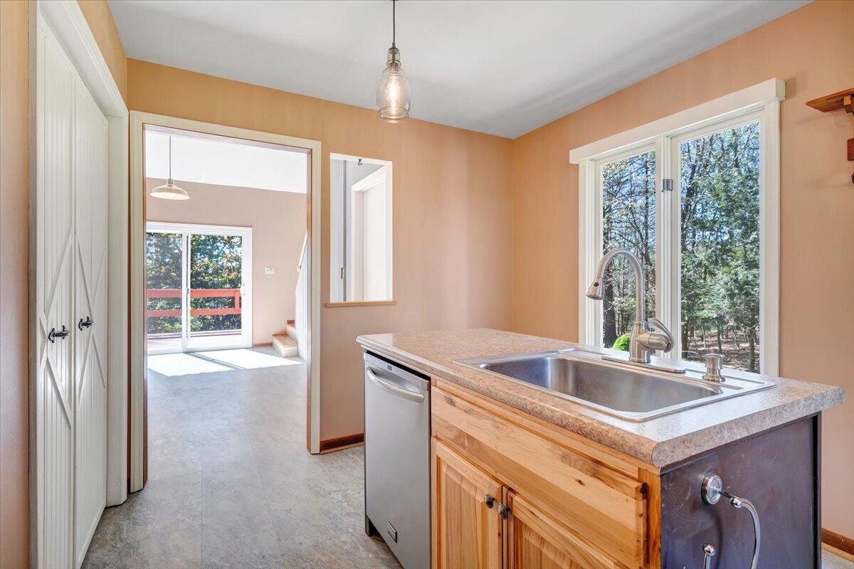 1465 Poff School Road Riner, VA 24149 - Photo 31 of 77 a kitchen that has a sink and a view of living room