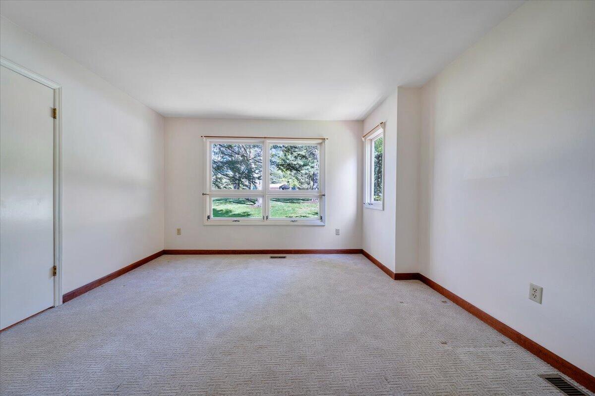 1465 Poff School Road Riner, VA 24149 - Photo 34 of 77 an empty room with windows