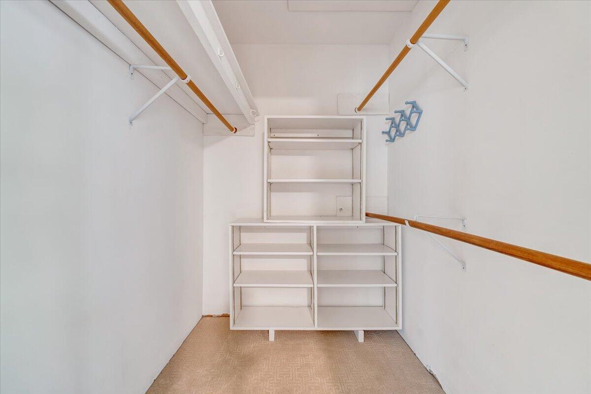 1465 Poff School Road Riner, VA 24149 - Photo 50 of 77 a view of walk in closet with empty racks