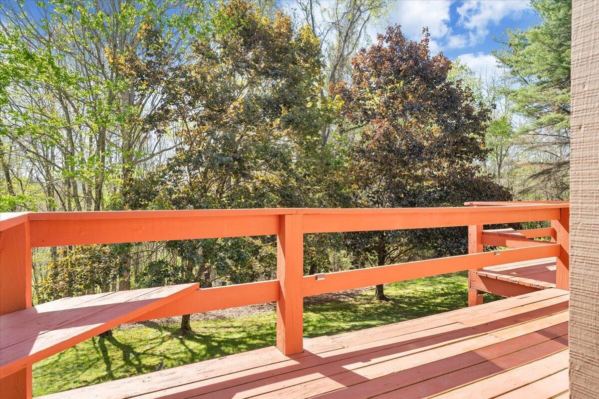 1465 Poff School Road Riner, VA 24149 - Photo 6 of 77 a view of a yard with wooden fence