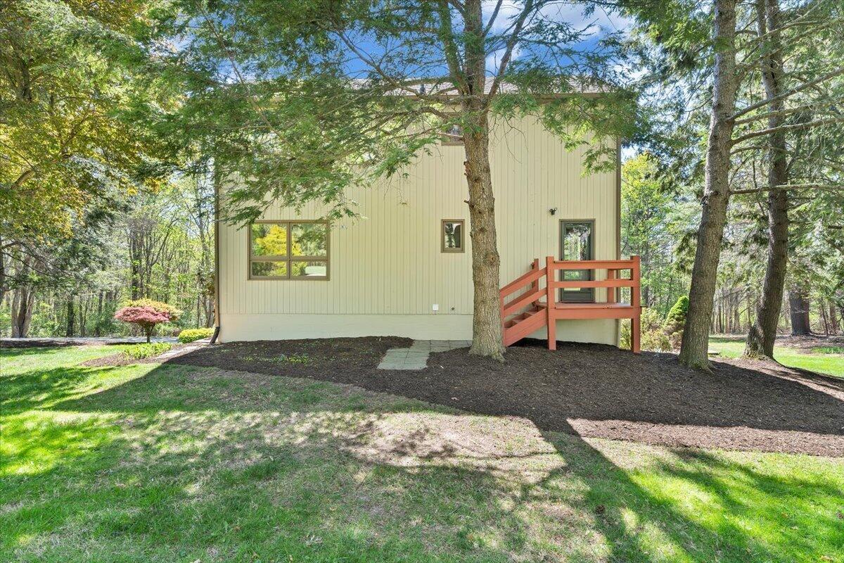 1465 Poff School Road Riner, VA 24149 - Photo 61 of 77 a backyard of a house with barbeque oven table and chairs