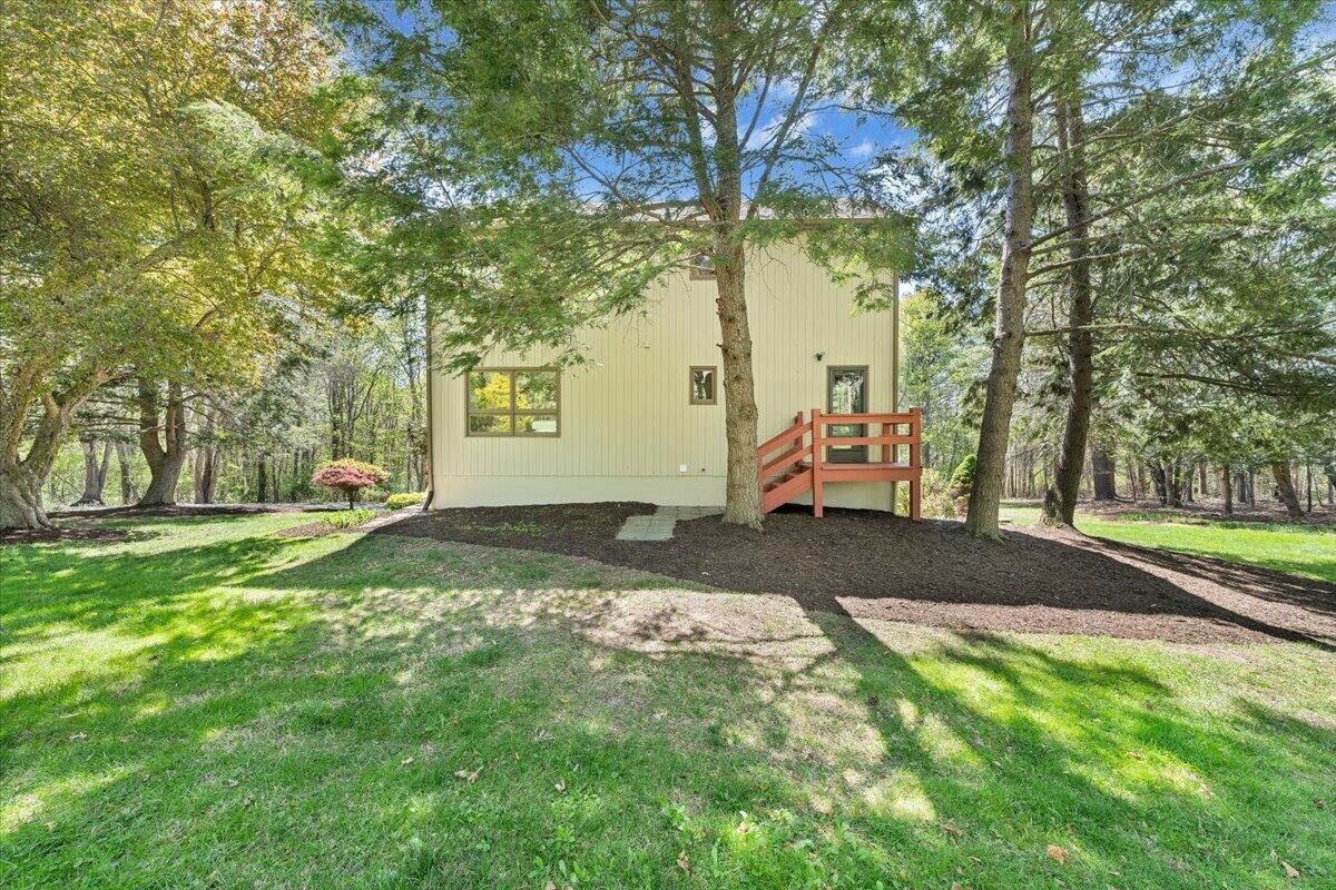 1465 Poff School Road Riner, VA 24149 - Photo 62 of 77 a backyard of a house with table and chairs