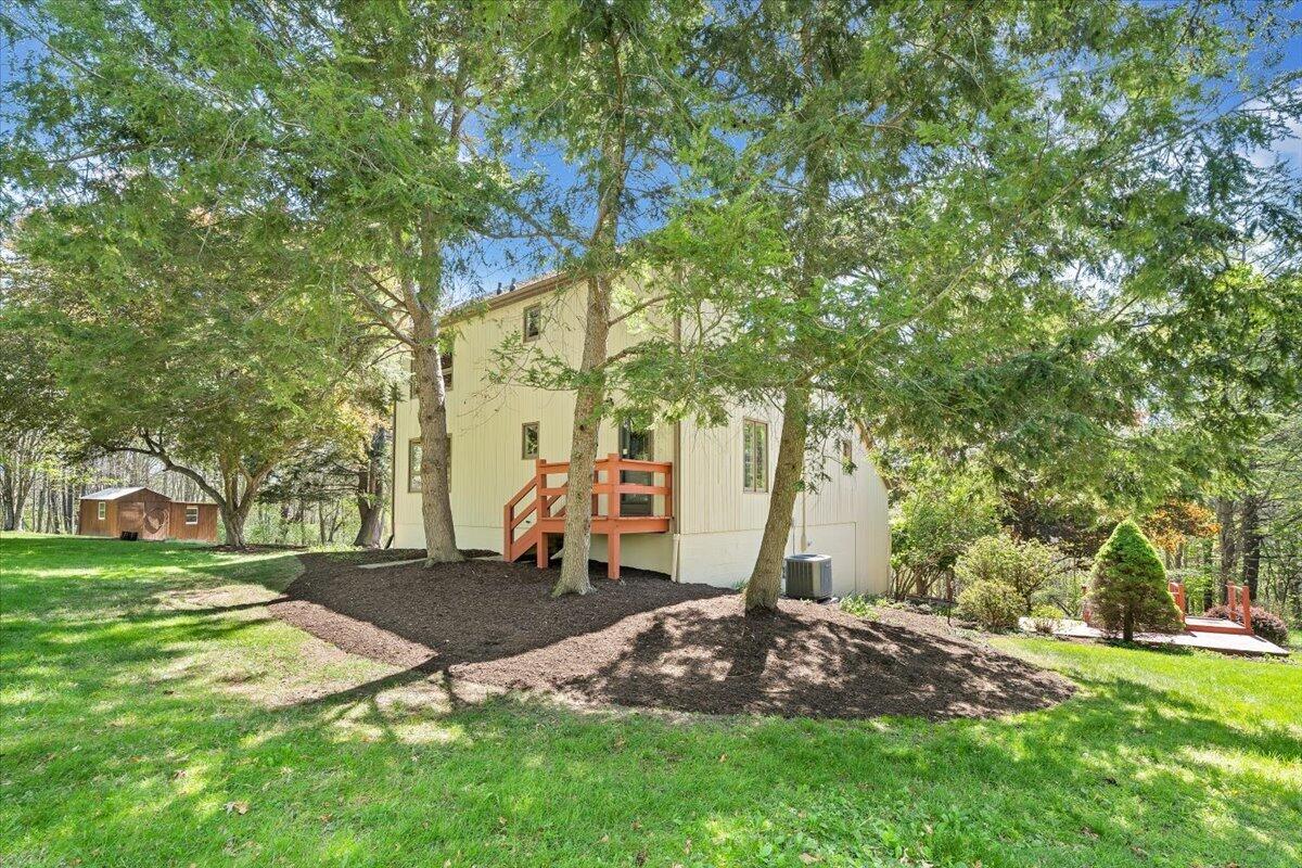 1465 Poff School Road Riner, VA 24149 - Photo 64 of 77 a view of a backyard with a tree