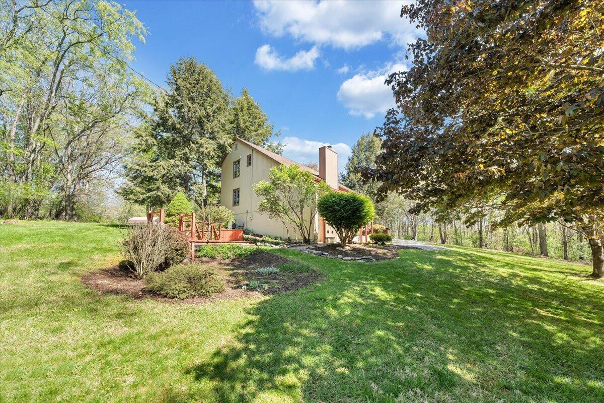 1465 Poff School Road Riner, VA 24149 - Photo 69 of 77 a backyard of a house with table and chairs