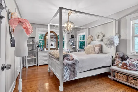 a view of a backyard with sitting area and furniture