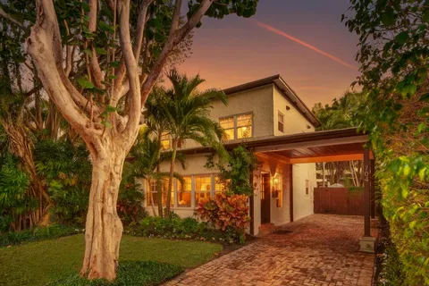 front view of a house with a small yard