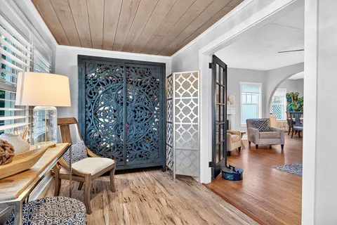 a room with furniture and a rug