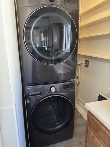 a utility room with washing machine