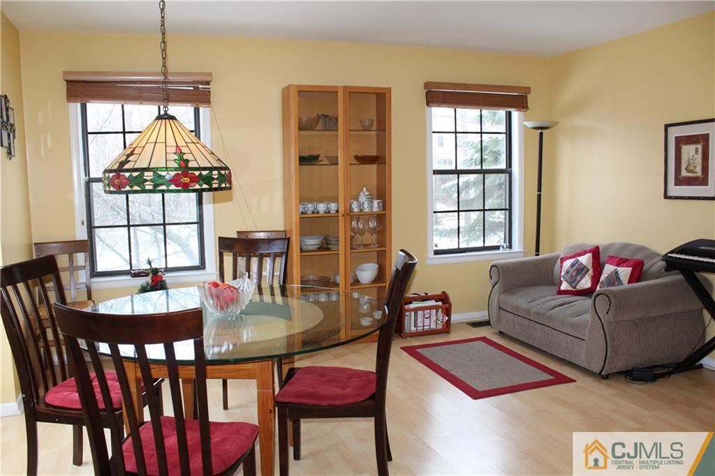 4901 Stonehedge Road, Unit 4901 Edison, NJ 08820 - Photo 11 of 22 a living room with furniture and a window