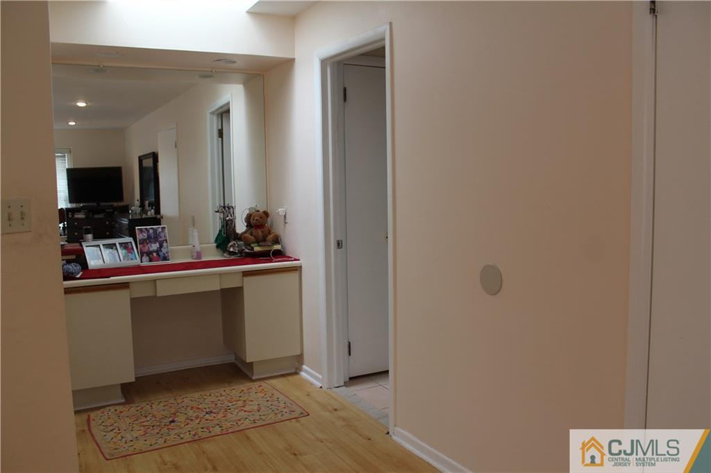 4901 Stonehedge Road, Unit 4901 Edison, NJ 08820 - Photo 16 of 22 a room with storage and utility