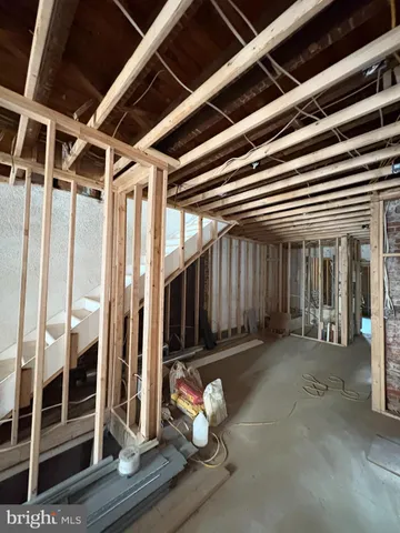 a view of a porch with wooden floor