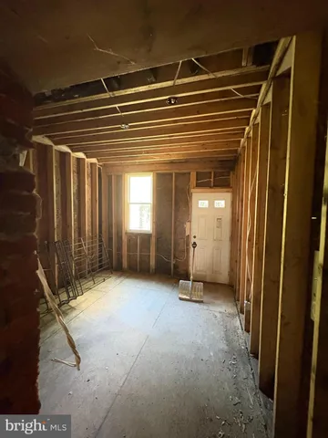 a view of a room with large windows