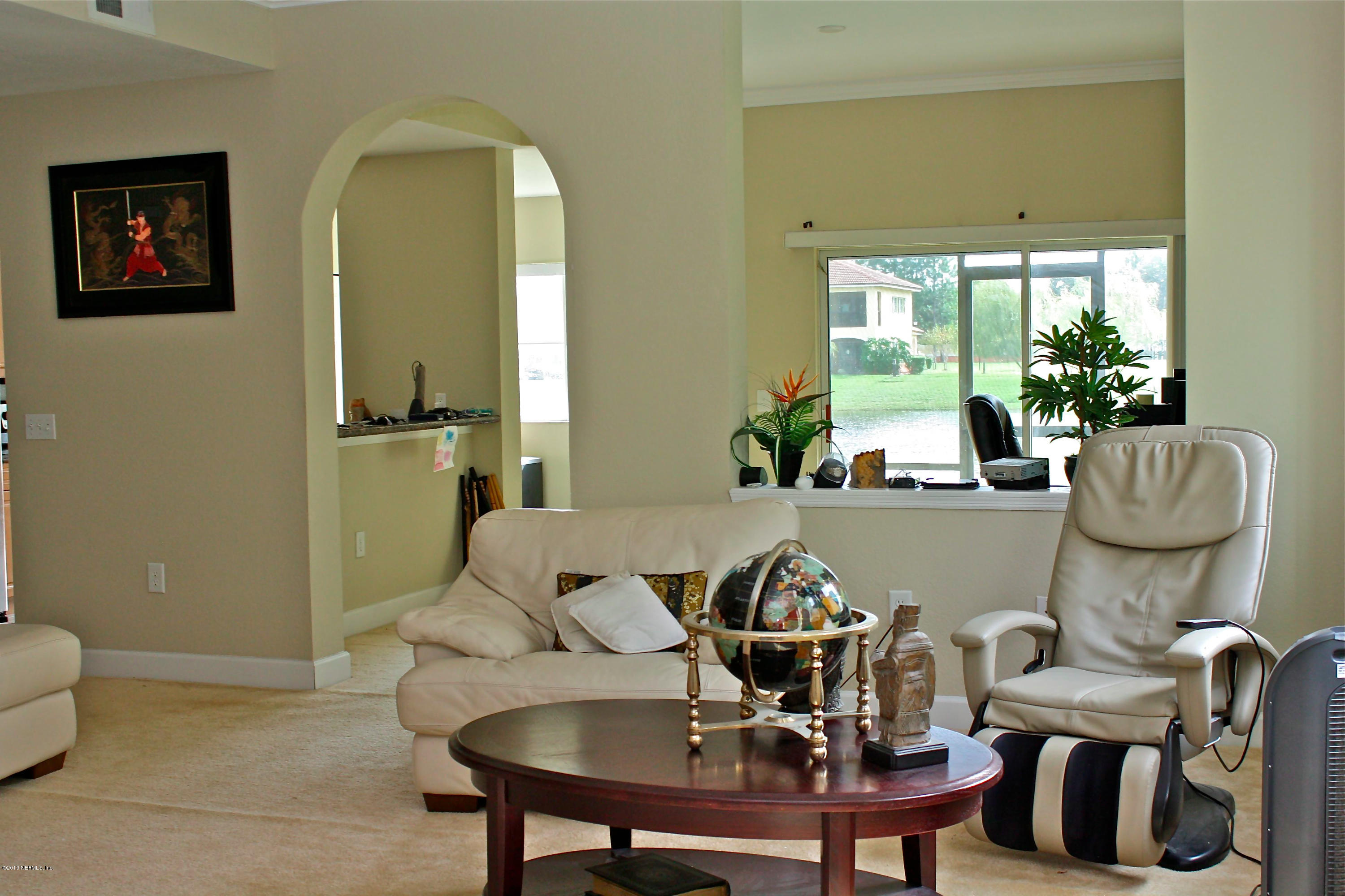 9745 Touchton Road, Unit 3108 Jacksonville, FL 32246 - Photo 12 of 25 Living room looking into family room