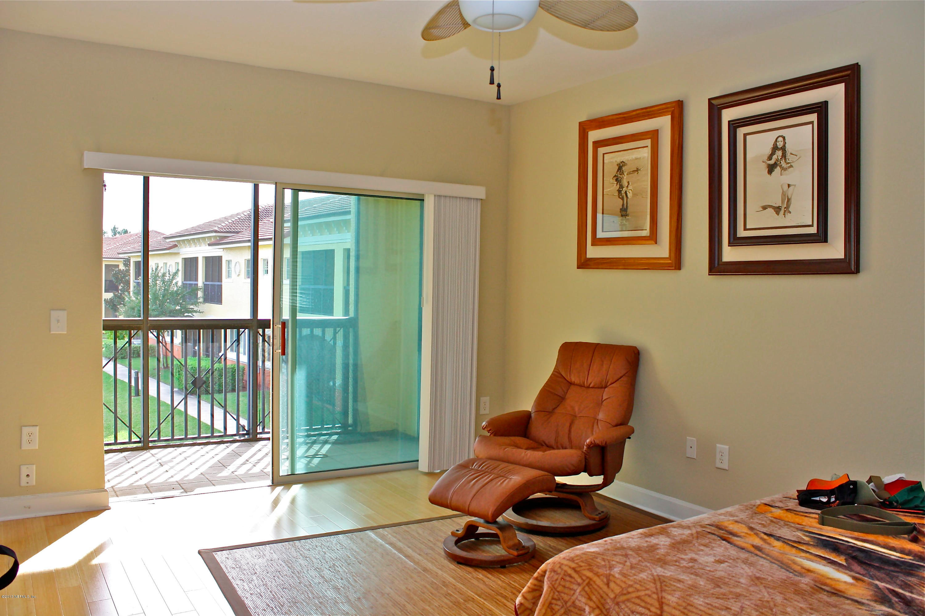 9745 Touchton Road, Unit 3108 Jacksonville, FL 32246 - Photo 17 of 25 Master bedroom with screened balcony