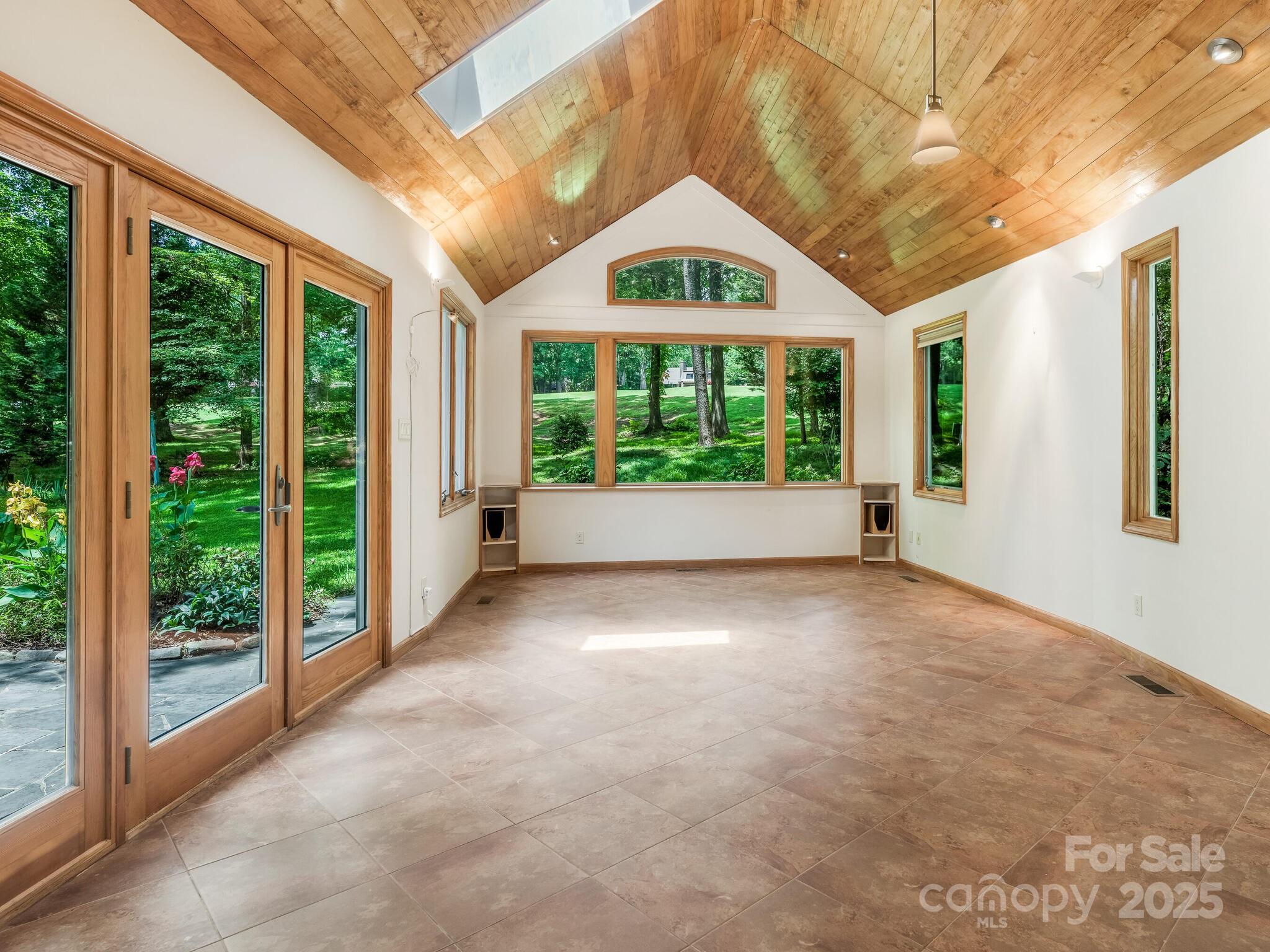 3310 Windbluff Drive Charlotte, NC 28277 - Photo 11 of 45 a view of an empty room with windows