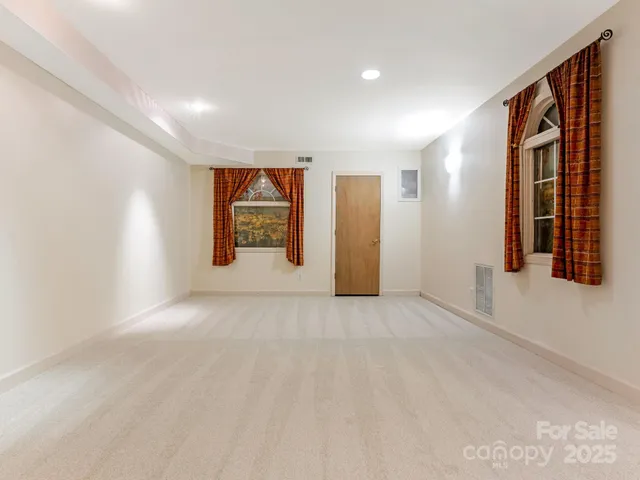 a view of an empty room with window