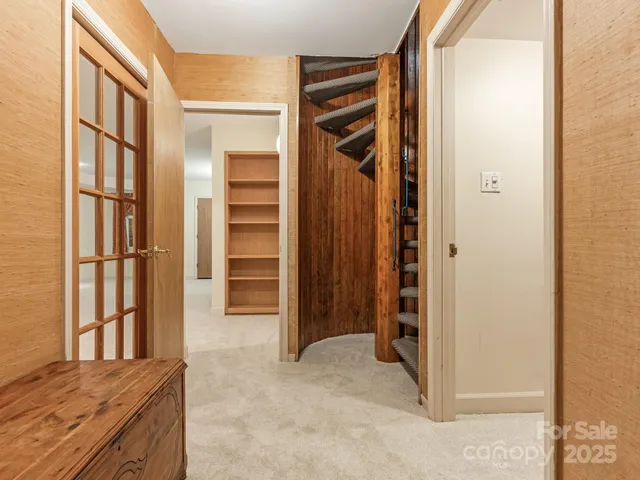 a view of room with closet and windows