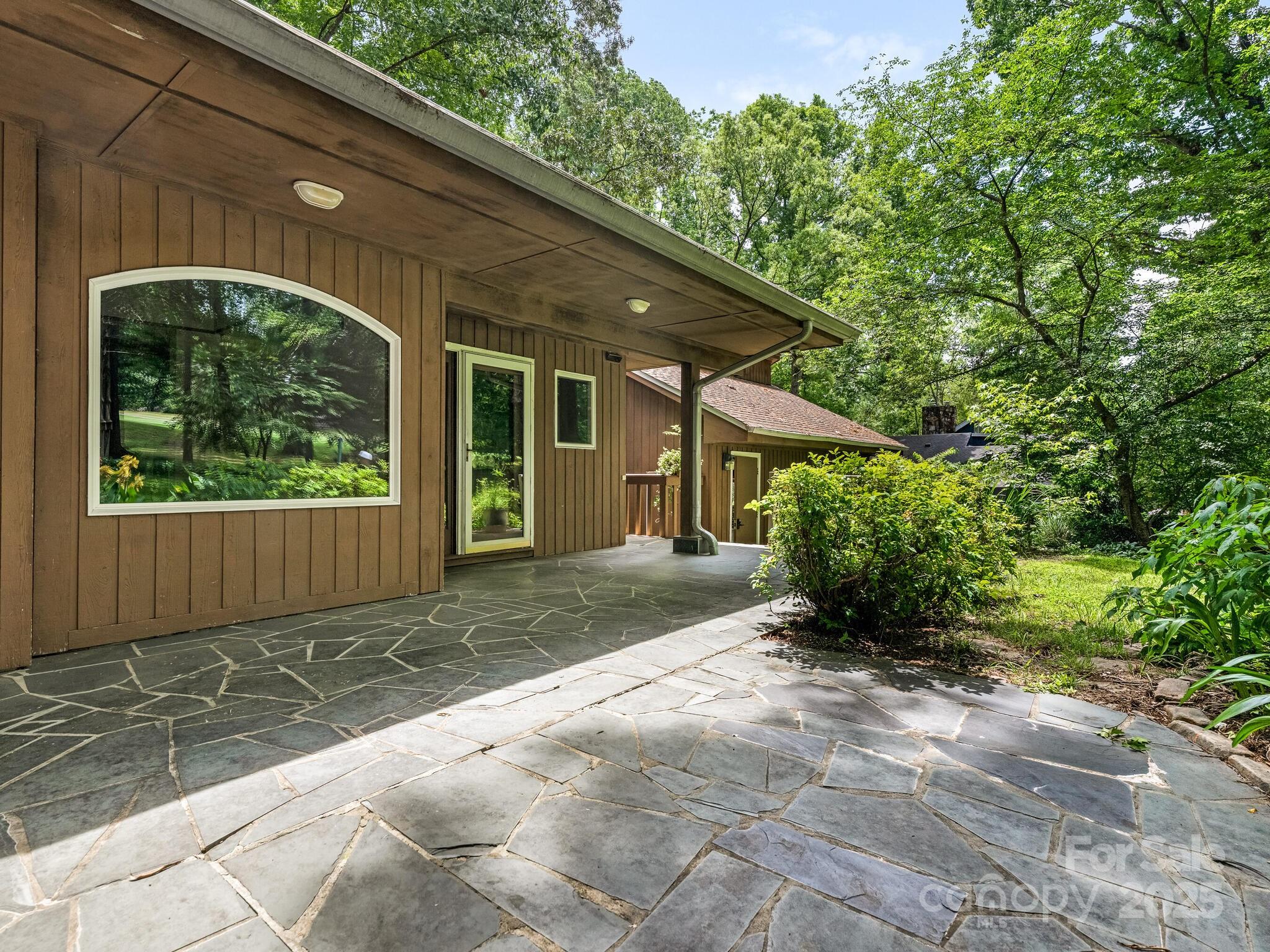 3310 Windbluff Drive Charlotte, NC 28277 - Photo 36 of 45 a view of a house with a yard