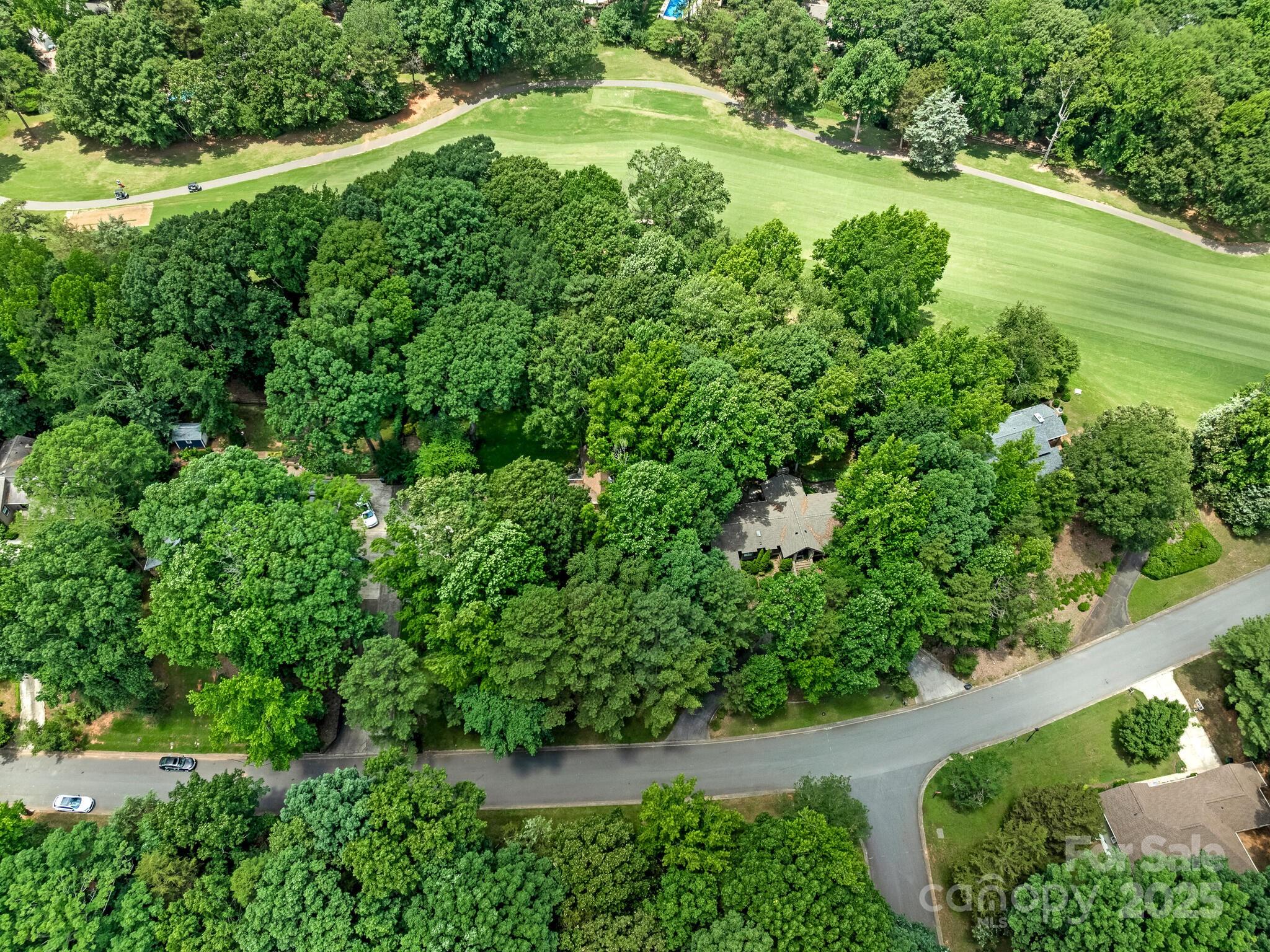 3310 Windbluff Drive Charlotte, NC 28277 - Photo 41 of 45 an aerial view of a houses with outdoor space and trees all around