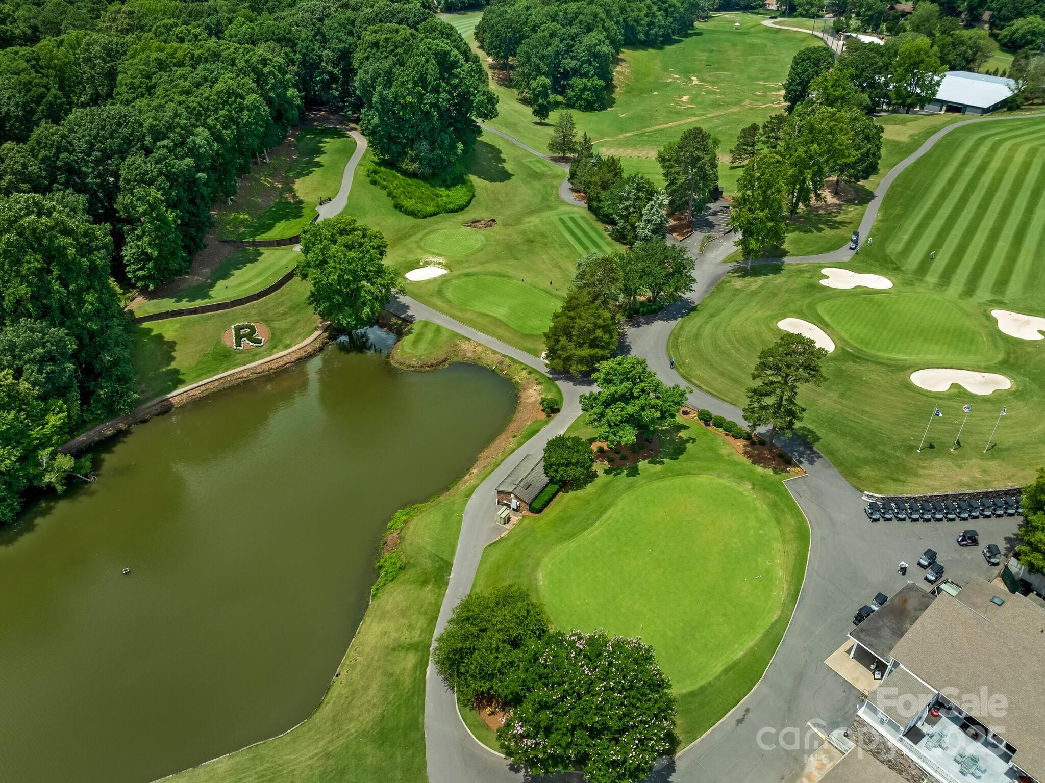 3310 Windbluff Drive Charlotte, NC 28277 - Photo 45 of 45 a view of a swimming pool with a yard and plants