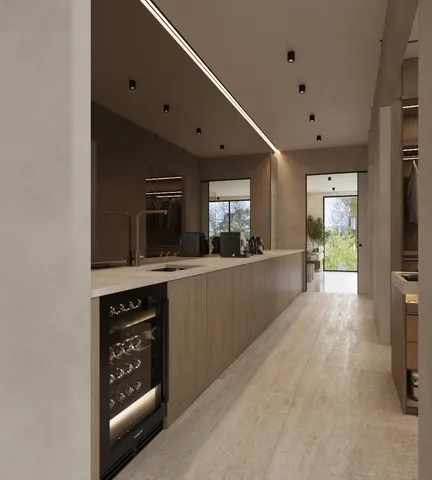 a view of a kitchen center island and a window