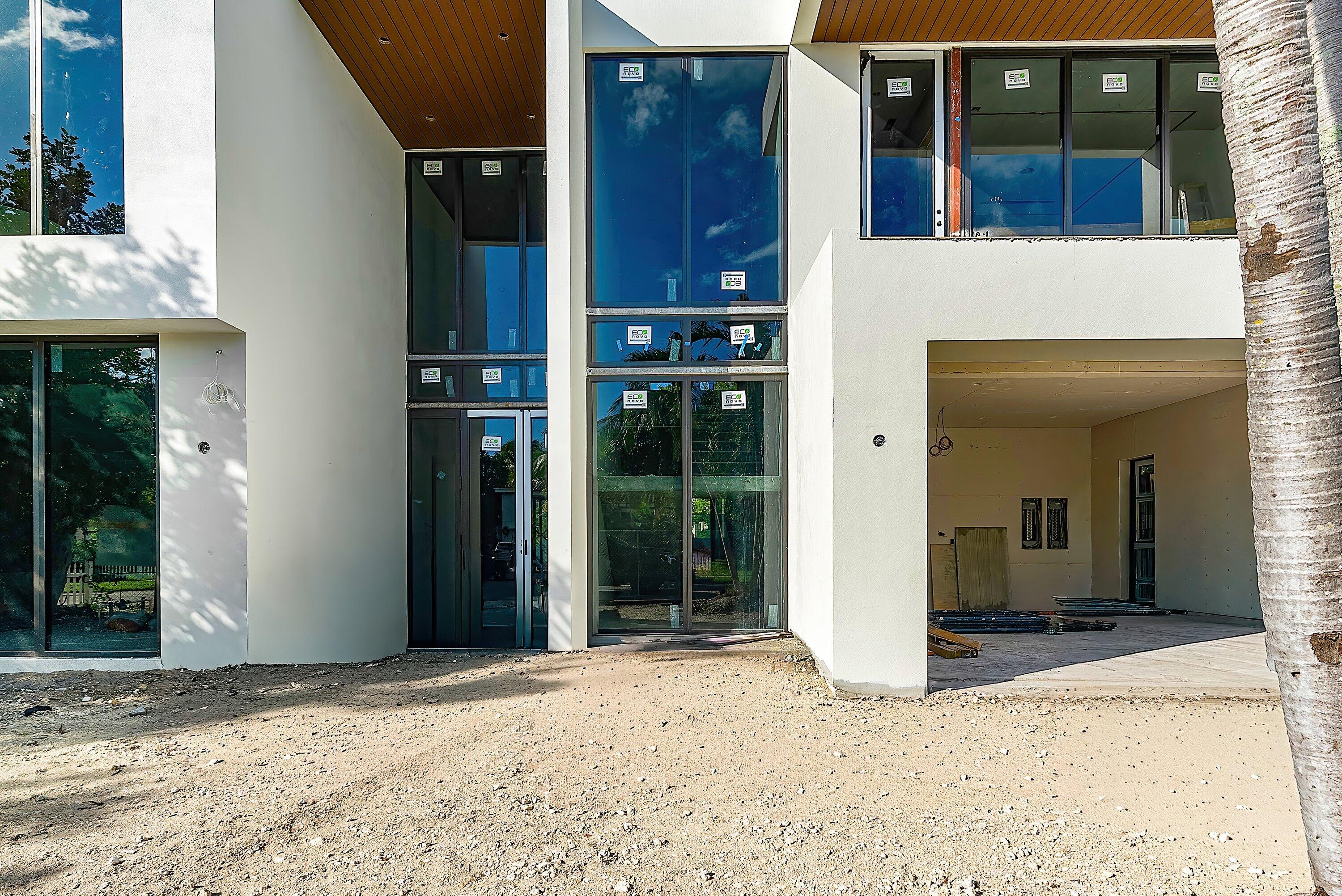 1505 Northeast 4th Avenue Boca Raton, FL 33432 - Photo 27 of 39 front view of a house with a porch