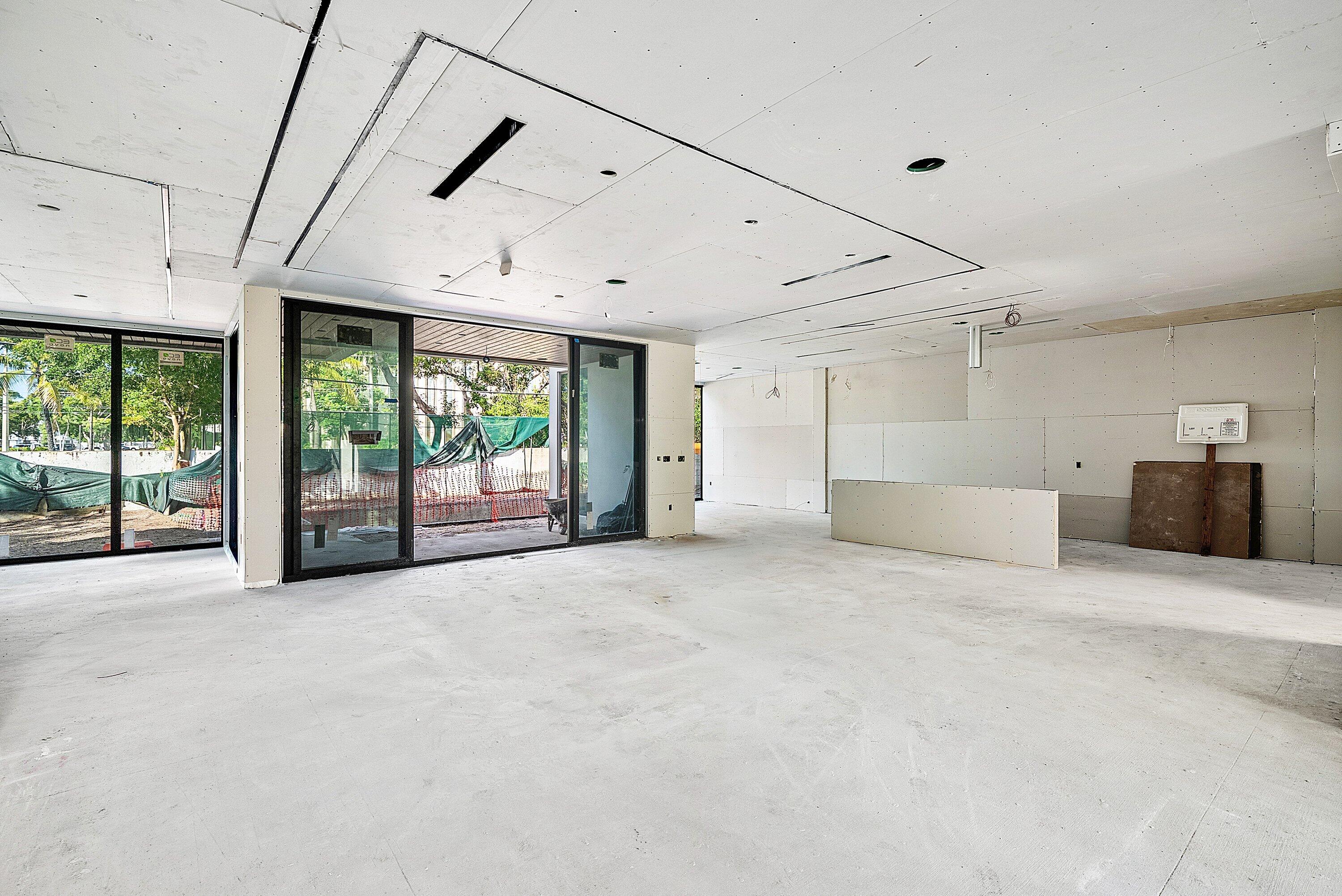 1505 Northeast 4th Avenue Boca Raton, FL 33432 - Photo 35 of 39 a view of a livingroom with an empty space and a window