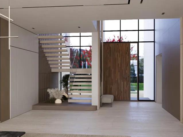 a view of entryway with wooden floor