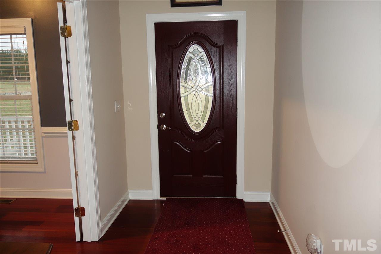 5638 Raleigh Road Kittrell, NC 27544 - Photo 3 of 25 a view of a livingroom with furniture and wooden floor