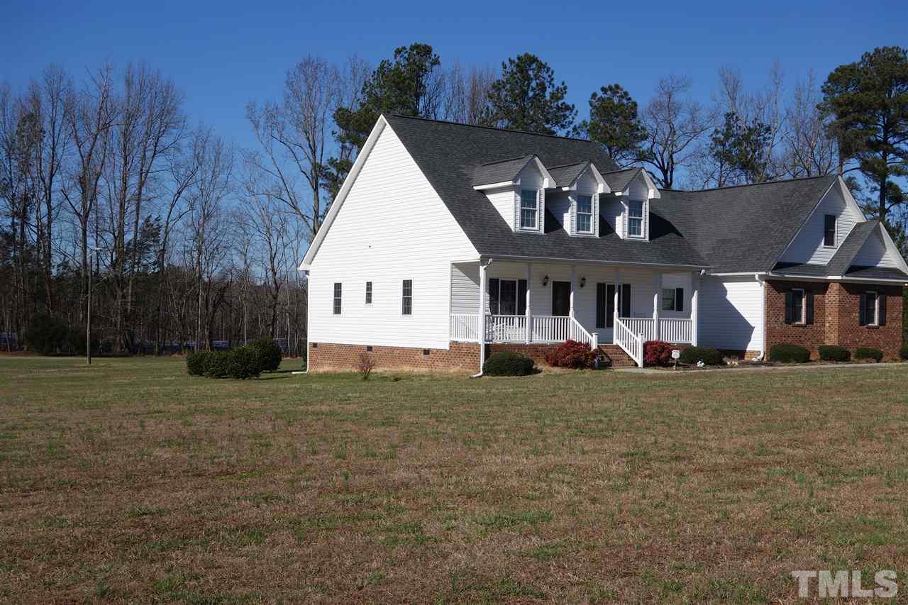 5638 Raleigh Road Kittrell, NC 27544 - Photo 22 of 25 a view of a house with a yard and tree s